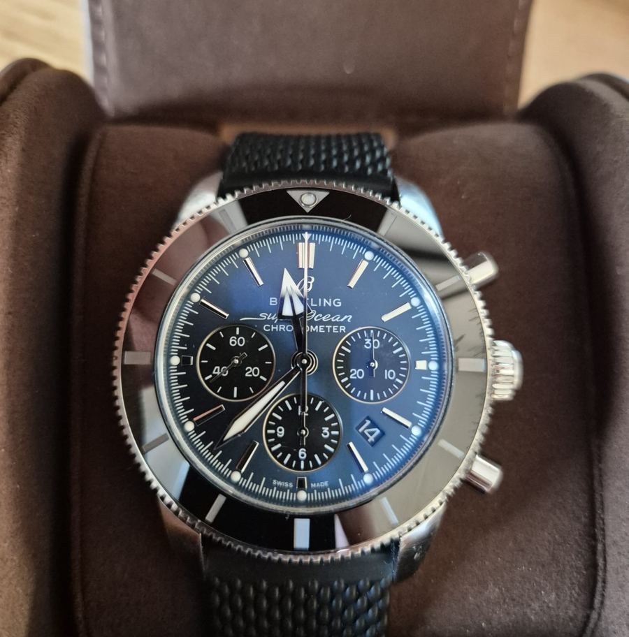 Breitling Superocean Heritage chronograph with blue dial, black bezel and rubber strap in its presentation box