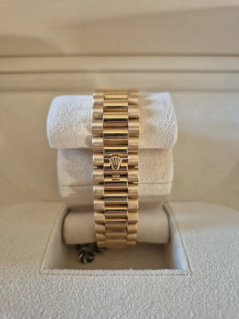 Yellow gold Rolex Day-Date on a President bracelet, side view