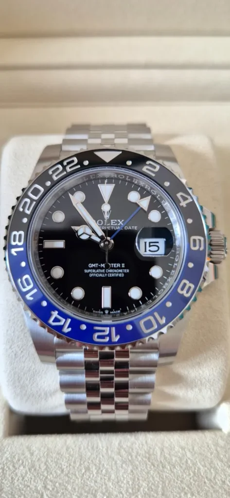 Rolex GMT-Master II with blue and black Batman bezel on a Jubilee bracelet in its box